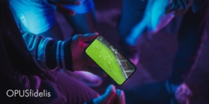 A person watches soccer on their phone.