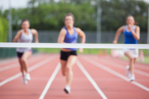 Athletes racing towards finish line